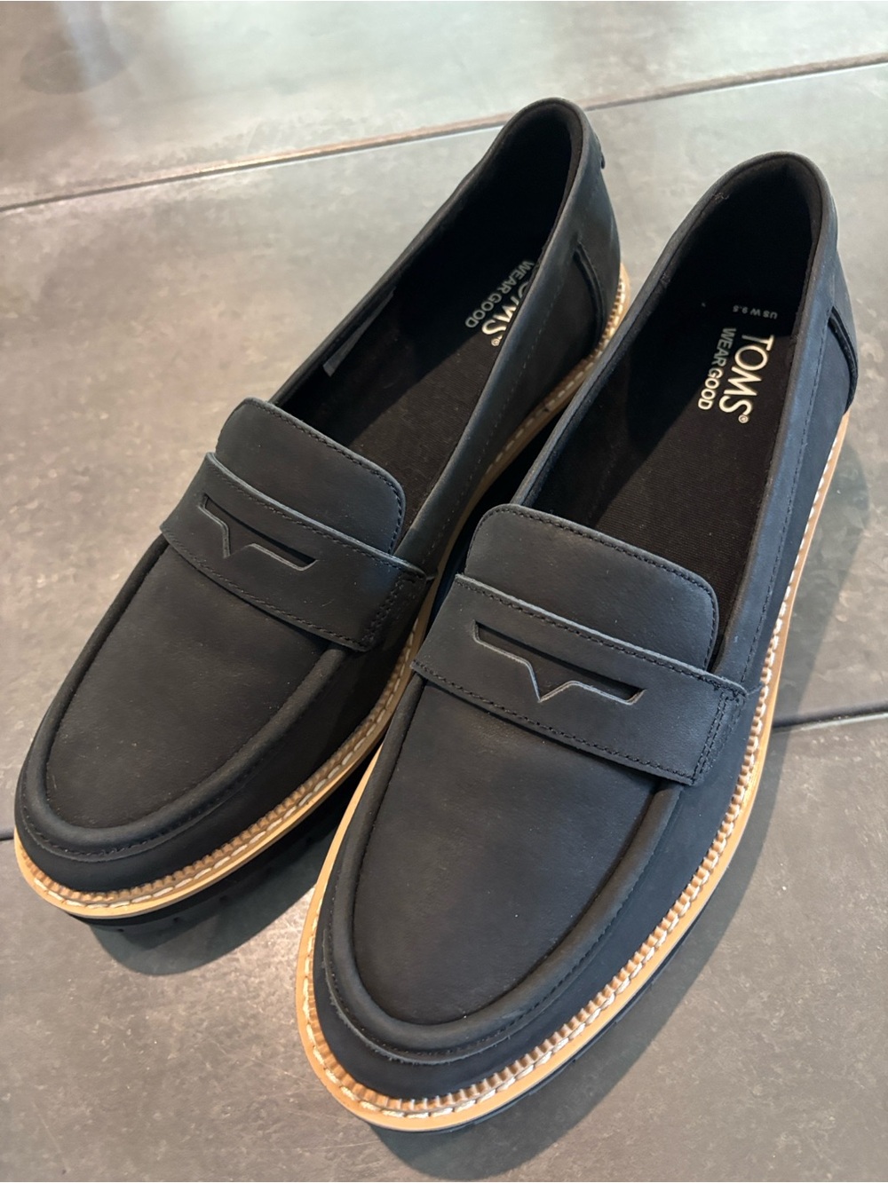 TOMS Black Cara Lug Loafers with Tan Trim